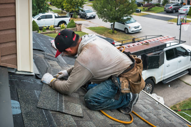 Professional Roof Replacement technician working in Woodcliff Lake, NJ